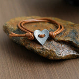 Amoura - Pulsera hecha a mano con símbolo del corazón